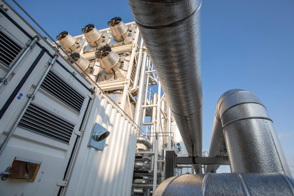 The Swiss company Climeworks are running 30 DAC - Direct Air Capture - fans on the roof of this garbage incinerator in Hinwil outside Zurich. Each modular carbon capture unit is capable of sucking up to 135 kilo of CO2 out of the air daily. 