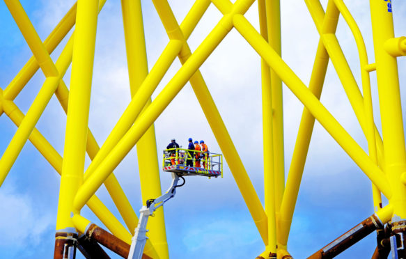 Wind turbine tops under construction and inspection with cherry picker at Smulders Howdon Tyneside yard.