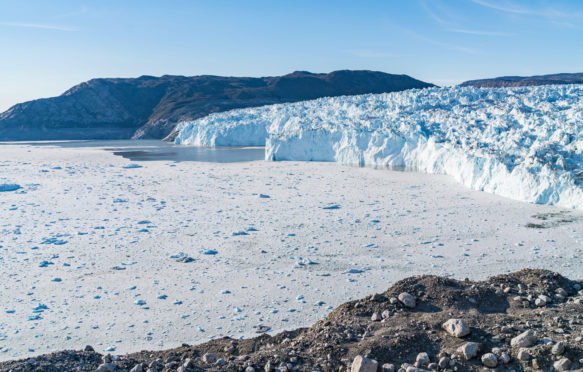 Glacier front of Eqi glacier in West Greenland.