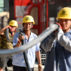 Chinese migrant workers of CREC labor at the construction site of the Huai'an East Railway Station for high-speed railway.
