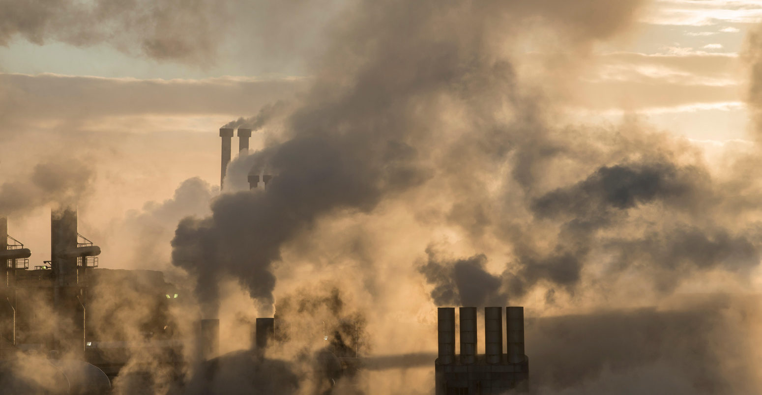 Smoke emitting from factory