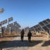 Workers walk at a solar power station in Tongchuan, Shaanxi province, China December 11, 2019. Picture taken December 11, 2019. Credit: REUTERS/Sean Yong