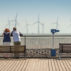 Tourists-enjoying-the-hot-weather-on-Skegness-Pier-and-viewing-the-offshore-wind-farms