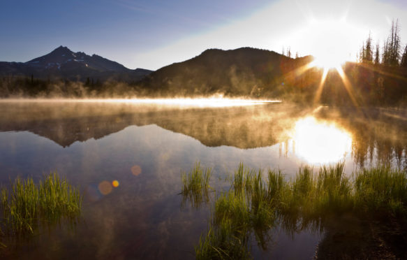 Morning mist at sunrise in Sparks Lake, Central Oregon