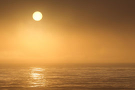 Sun setting over Pacific ocean