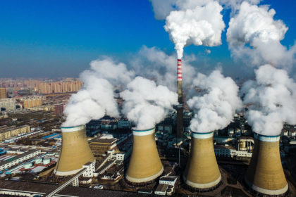 Smoke is discharged from chimneys at a coal-fired power plant in Datong city, Shanxi province