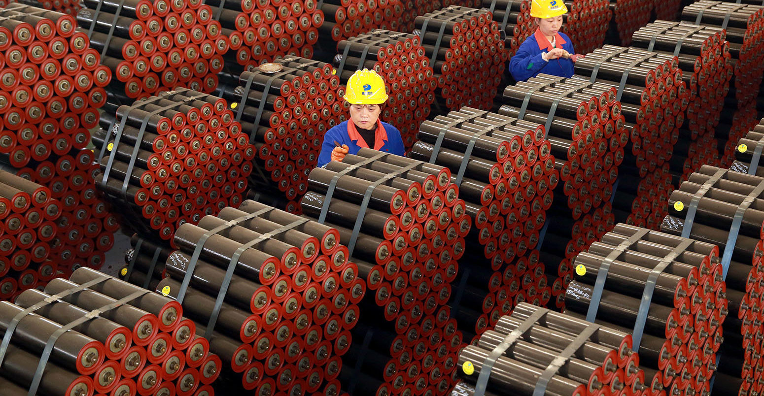 Factory workers in Tongcheng, China, on 17 November 2020. Credit: Costfoto / Alamy Stock Photo.