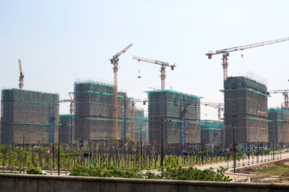 New apartments under construction in Yangzhou, Jiangsu, China. Credit: Charles O. Cecil / Alamy Stock Photo.