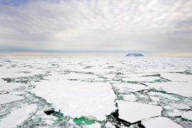 Small island in the Ross Sea, Antarctica, with pack ice in the foreground