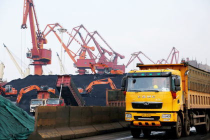 Several ships unload and transport coal at Lianyungang Port in Lianyungang.