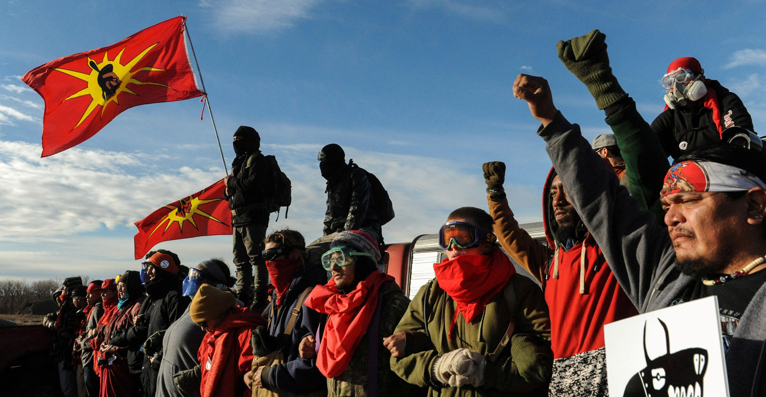 Protesters block a highway during a protest in Mandan against plans to pass the Dakota Access pipeline near the Standing Rock Indian Reservation_2CMRP74