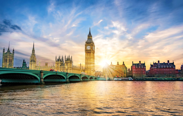 London cityscape with Big Ben and Westminster Bridge at sunset