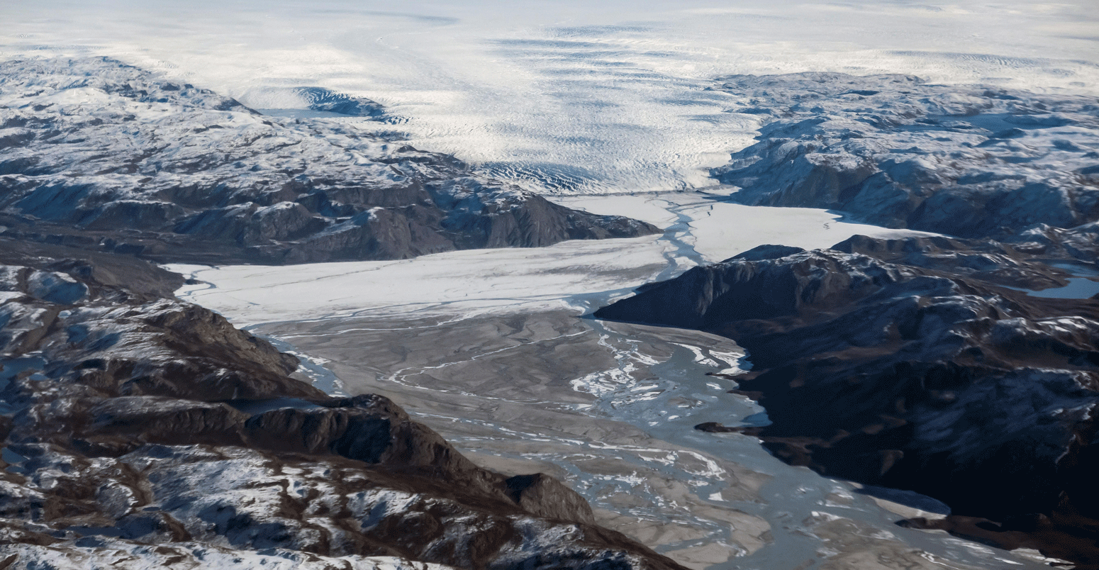 A glacier at the edge of the ice sheet, melting water and mud are pictured in the North of Kangerlussuaq, Greenland