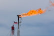 Natural gas is flared off as oil is pumped in the Bakken shale formation, North Dakota, USA
