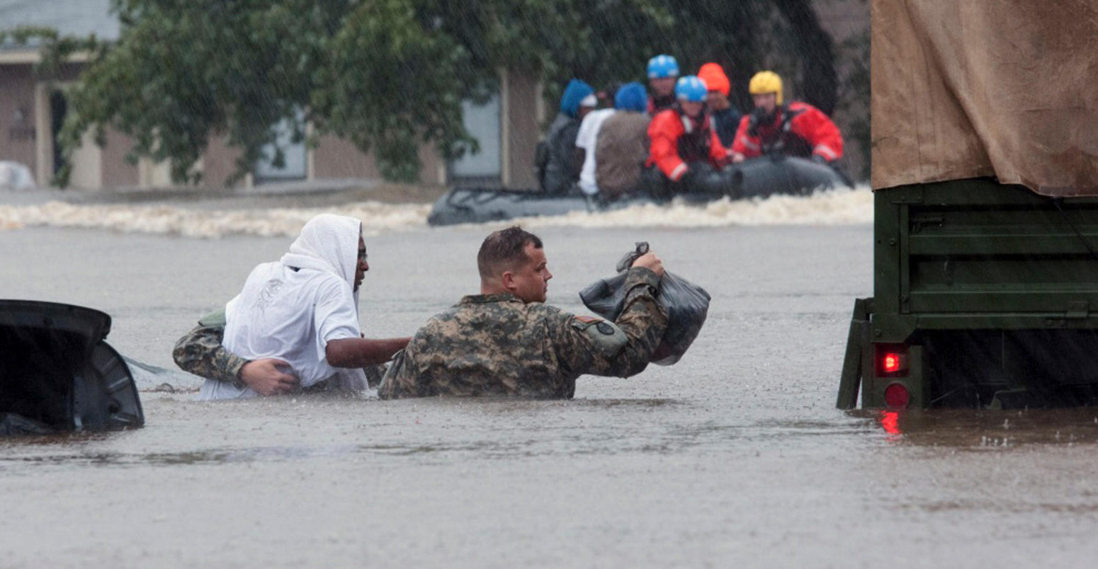 Army and local emergency services evacuate Fayetteville residents from floods caused by Hurricane Matthew_KHA8JE