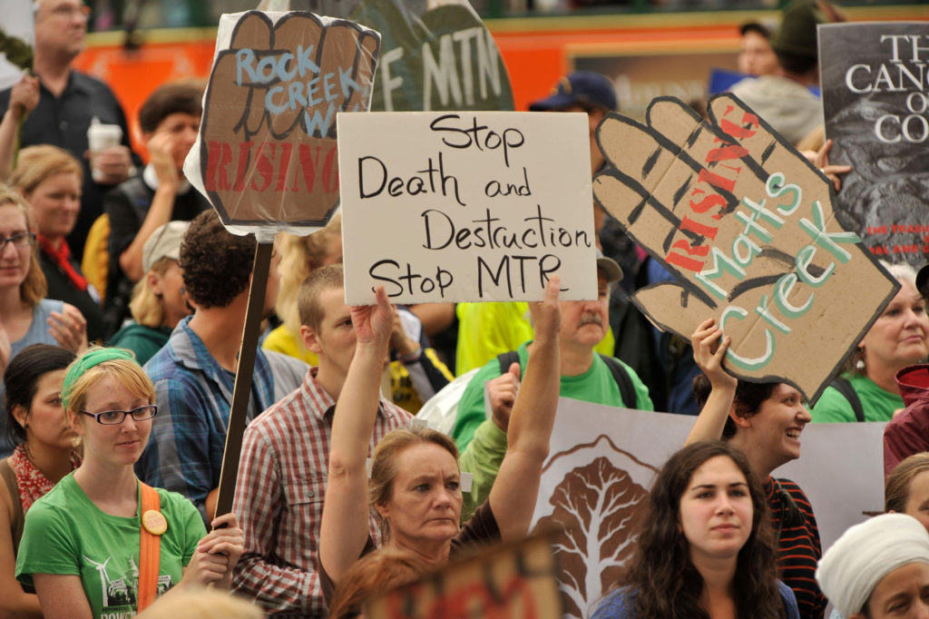 Hundreds of people opposed to a coal-mining process known as mountaintop removal used in Appalachia march past the EPA in Washington, 2010