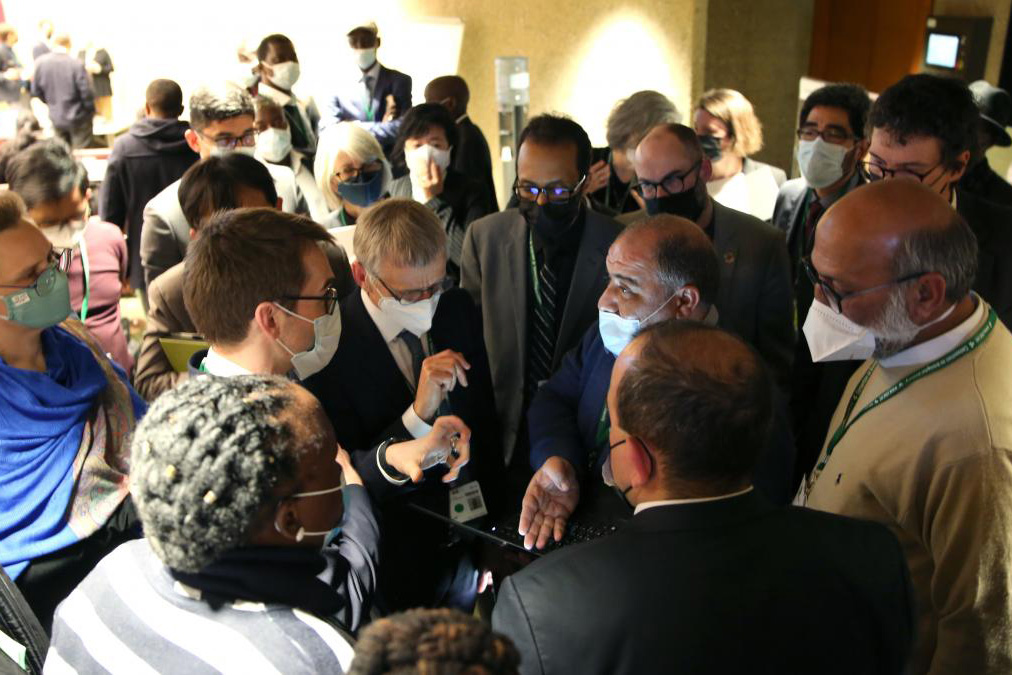 Delegates discuss a global deal to reverse nature loss at a UN biodiversity summit 2022 in Geneva