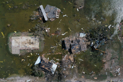 Homes and businesses destroyed by Hurricane Laura are surrounded by flood waters in the aftermath of Hurricane Delta in Louisiana, USA, 2020