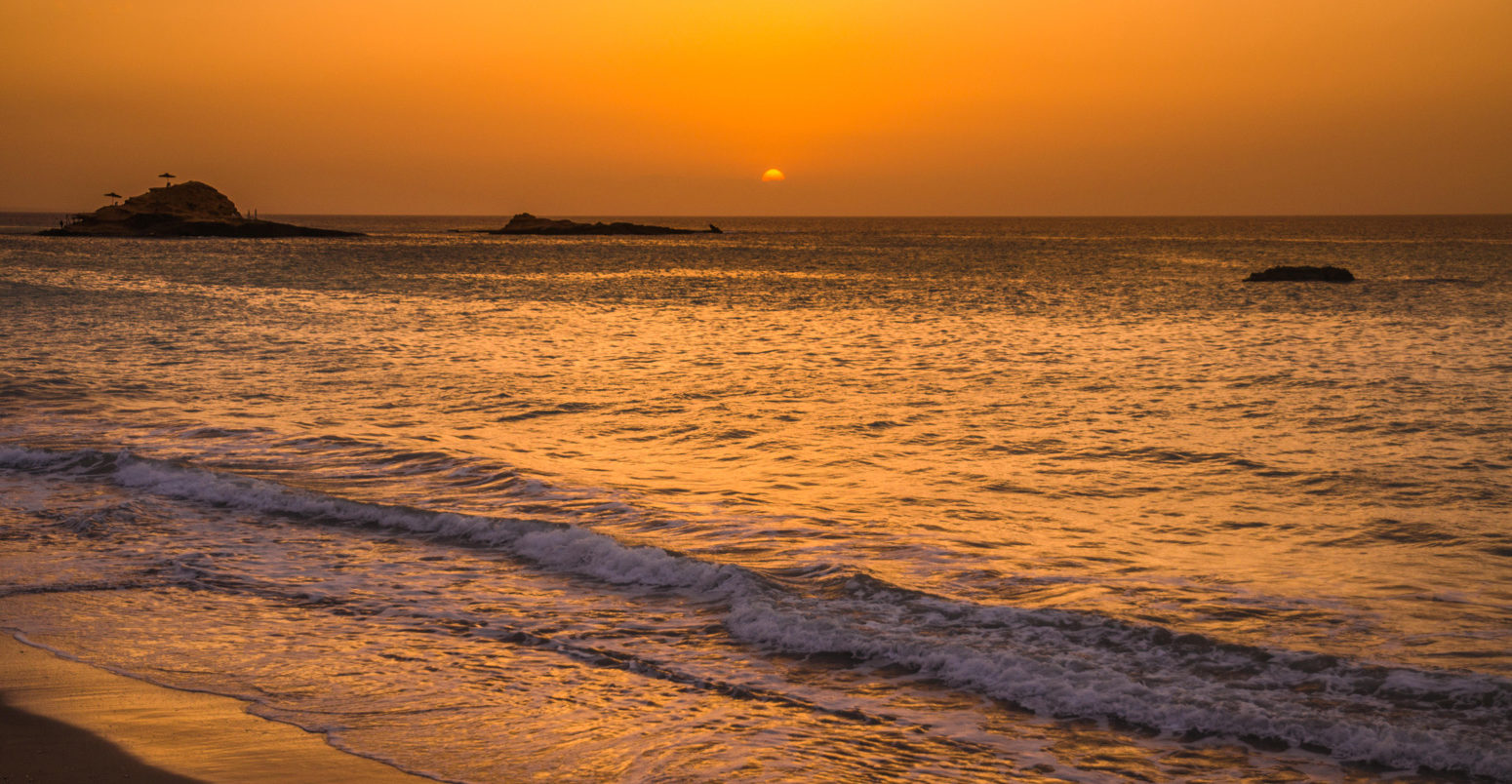 Orange sunset at the beach, USA