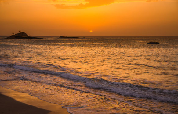 Orange sunset at the beach, USA