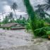 Rising water levels submerge a house as heavy monsoon rains cause major floods in Philippines