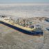 A gas carrier is loaded with liquefied natural gas at the berth in Russia