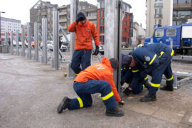 Installing flood defence barriers beside River Rheine in central Cologne, Germany.