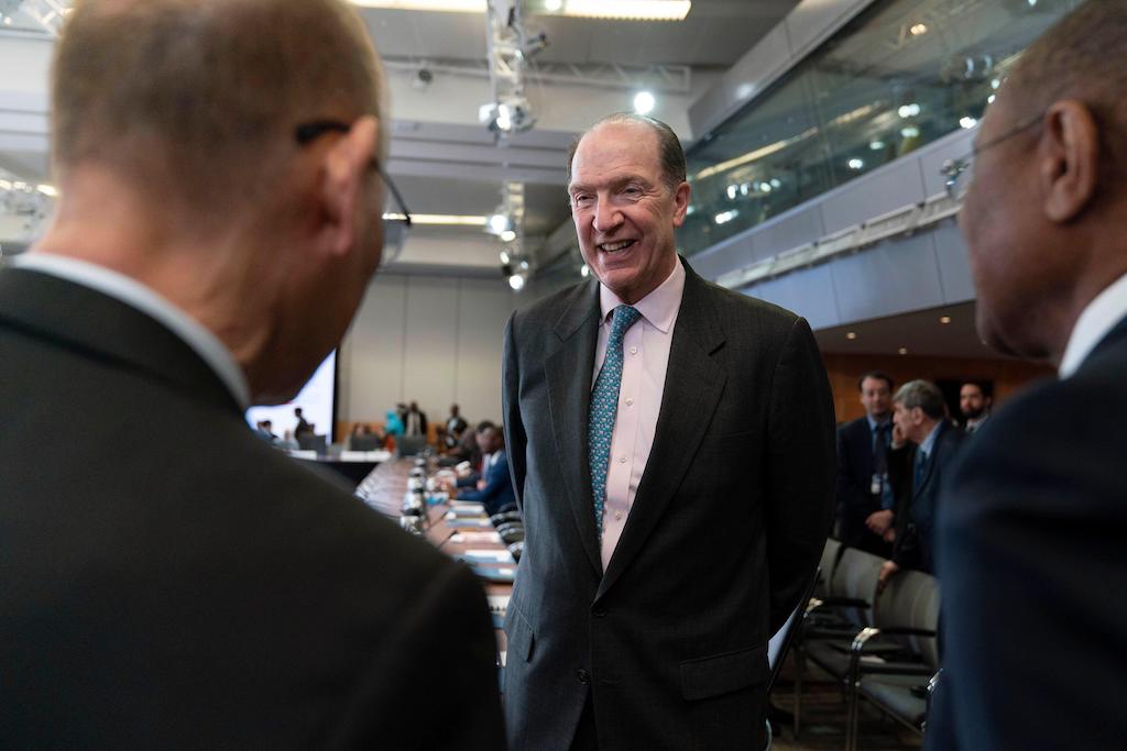 World Bank President David Malpass speaks with delegates during G-24 Finance Ministers and Central Bank Governors' meeting at the World Bank/IMF Spring Meetings at the International Monetary Fund (IMF) headquarters in Washington on 11 April 2023.
