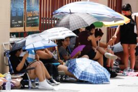 People take shelter from the heat in Spain, on 12 July 2023.