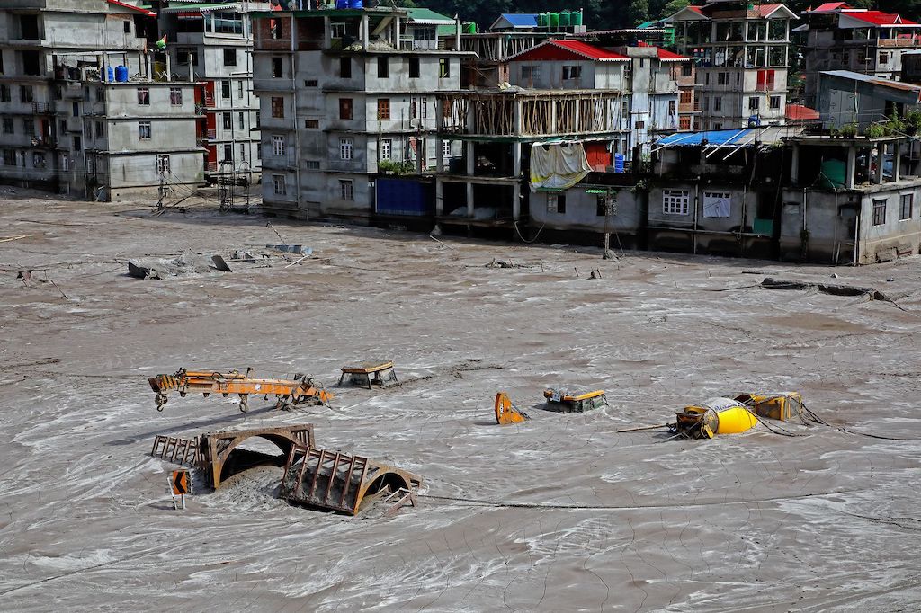 Flood damage in Sikkim, India, when the Teesta III dam was swept away by a GLOF in October 2023. Credit: Praful Rao / Save the Hills (2023)