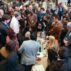 IPCC delegates negotiating in a huddle in Istanbul, Türkiye.