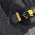Large machines stack coal in Jiangsu Province, China.