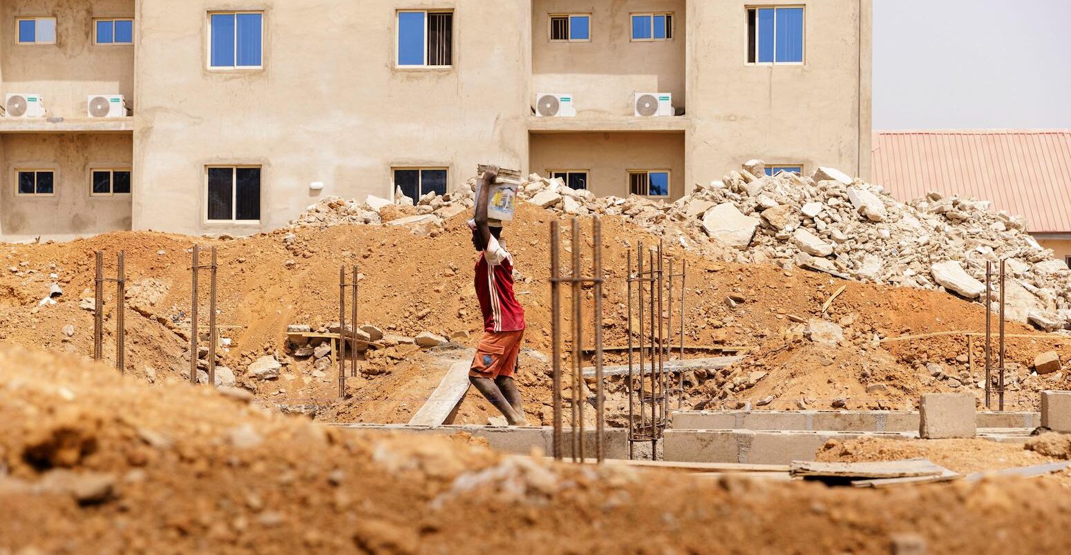 Young man works on a construction site in Nigeria on 6 February 2024.