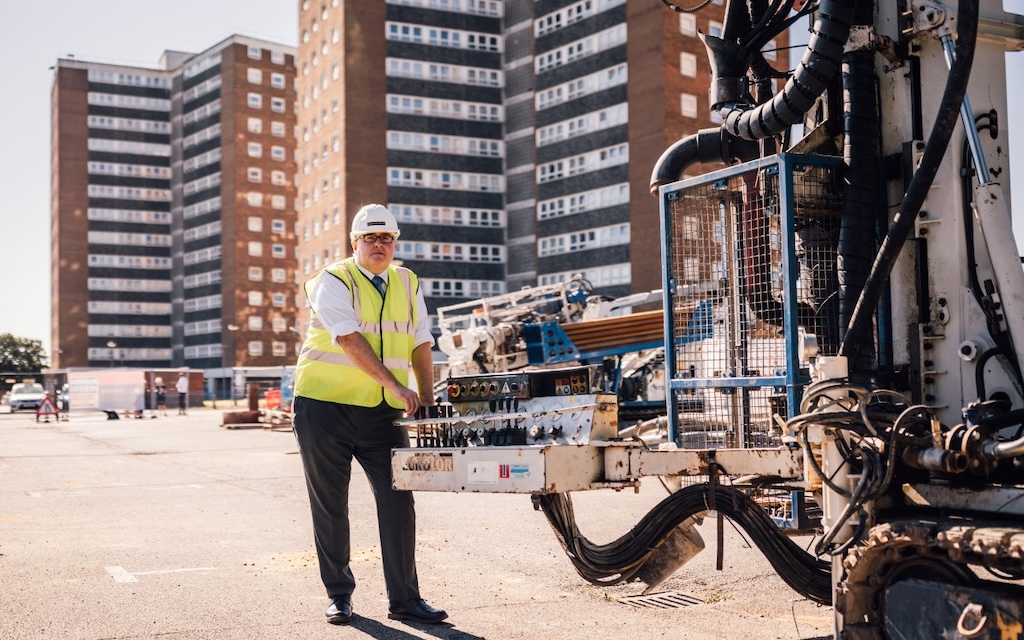 Cllr Gledhill pushes the button to start works at the Thurrock Council flats having the heat pumps installed