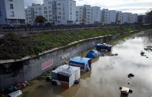 Flooded slums on the Garonne river banks