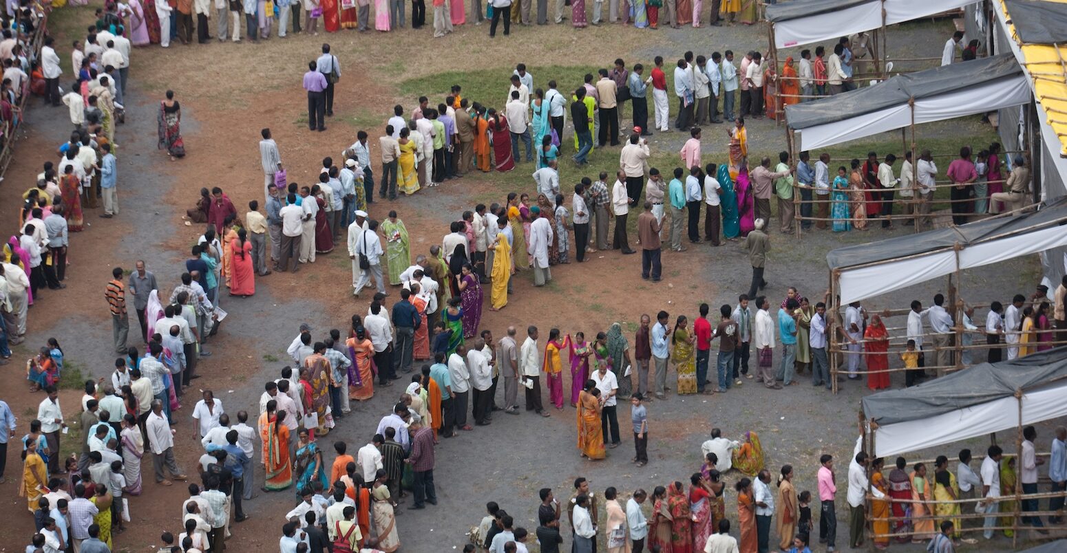 Voting queue at election polling station, Mumbai, India. Image ID: DH36MY. Credit: Dinodia Photos / Alamy Stock Photo.
