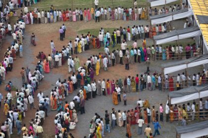 Voting queue at election polling station, Mumbai, India. Image ID: DH36MY. Credit: Dinodia Photos / Alamy Stock Photo.