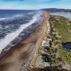 Rock shoreline structures to prevent sea level rise on the US pacific coast. Credit: Ken Hawkins / Alamy Stock Photo. Image ID: 2KTAYC1.