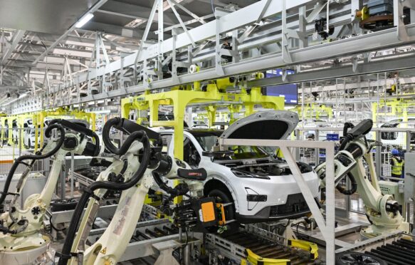 An automatic assembly line in Chongqing, southwest China.