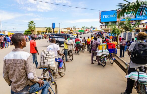 People gather to watch a cycling race in Muhanga, Rwanda.