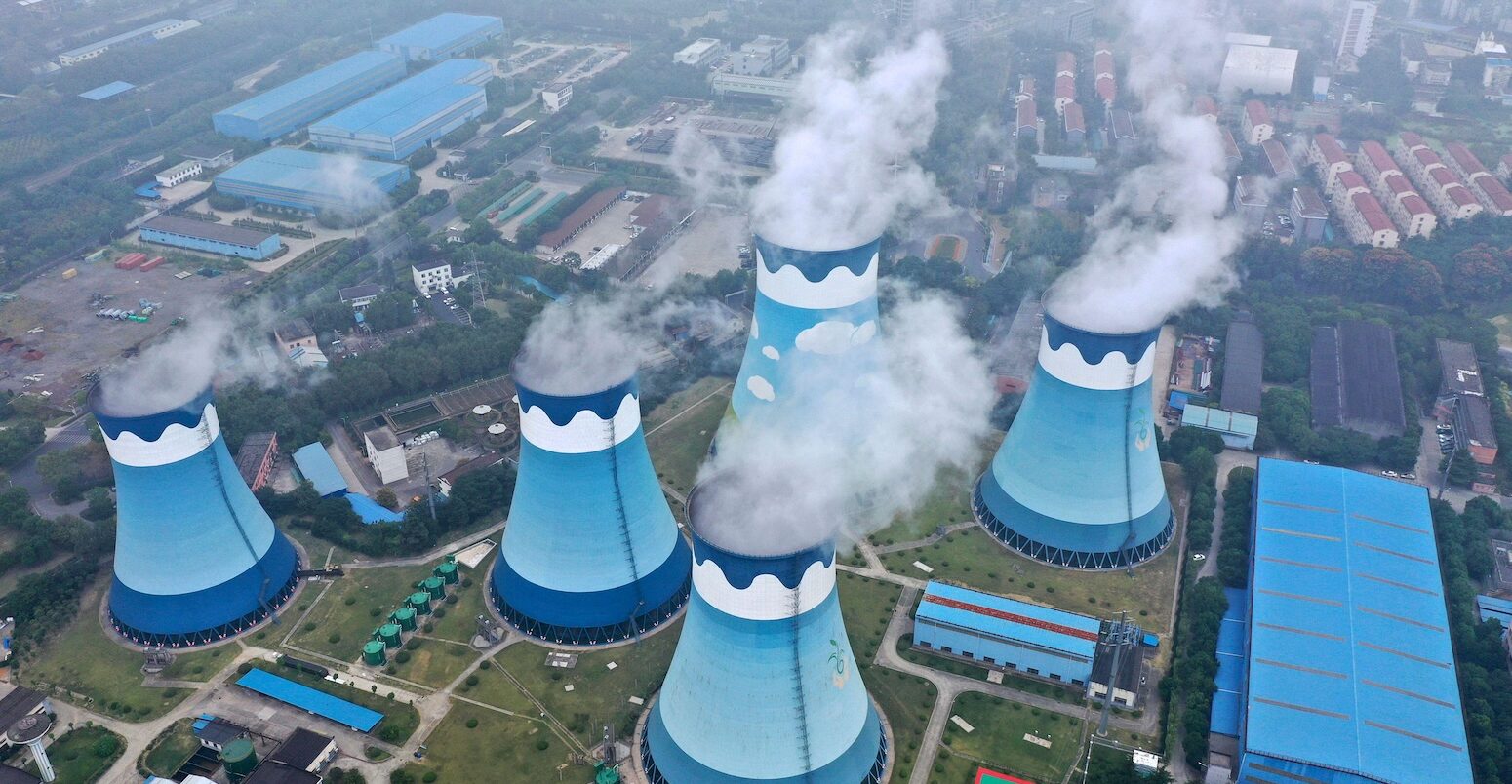 Cooling towers at a coal-fired power station in Nanjing, Jiangsu province, China. Credit: Associated Press / Alamy Stock Photo. Image ID: 2NMJBJ1.