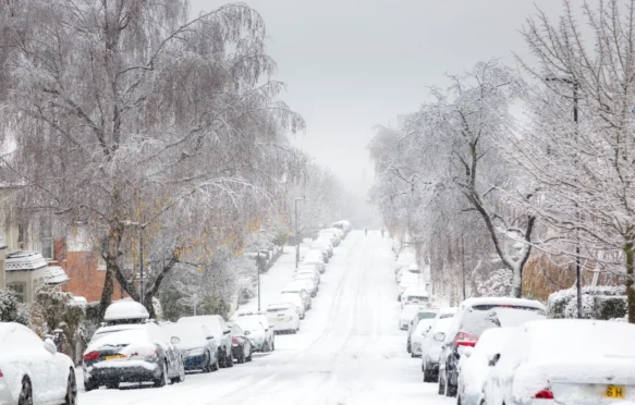 Snow-covered street in London, UK.