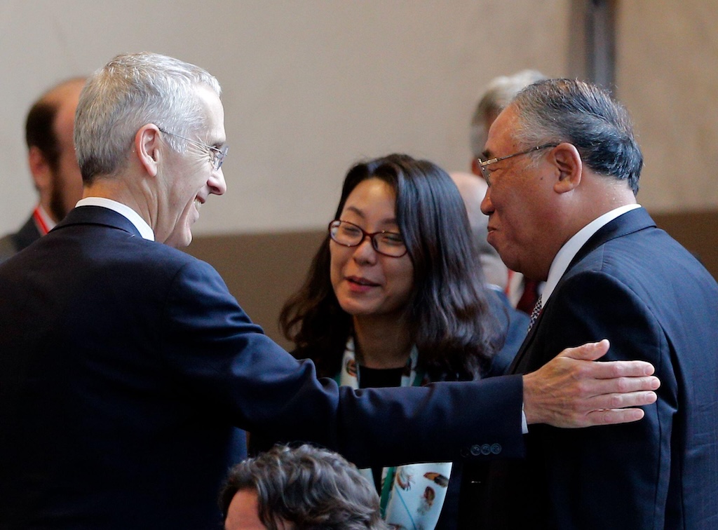 US special envoy for climate change Todd Stern speaks with Xie Zhenhua, special representative for climate change affairs of China's national development and reform commission, at COP21.