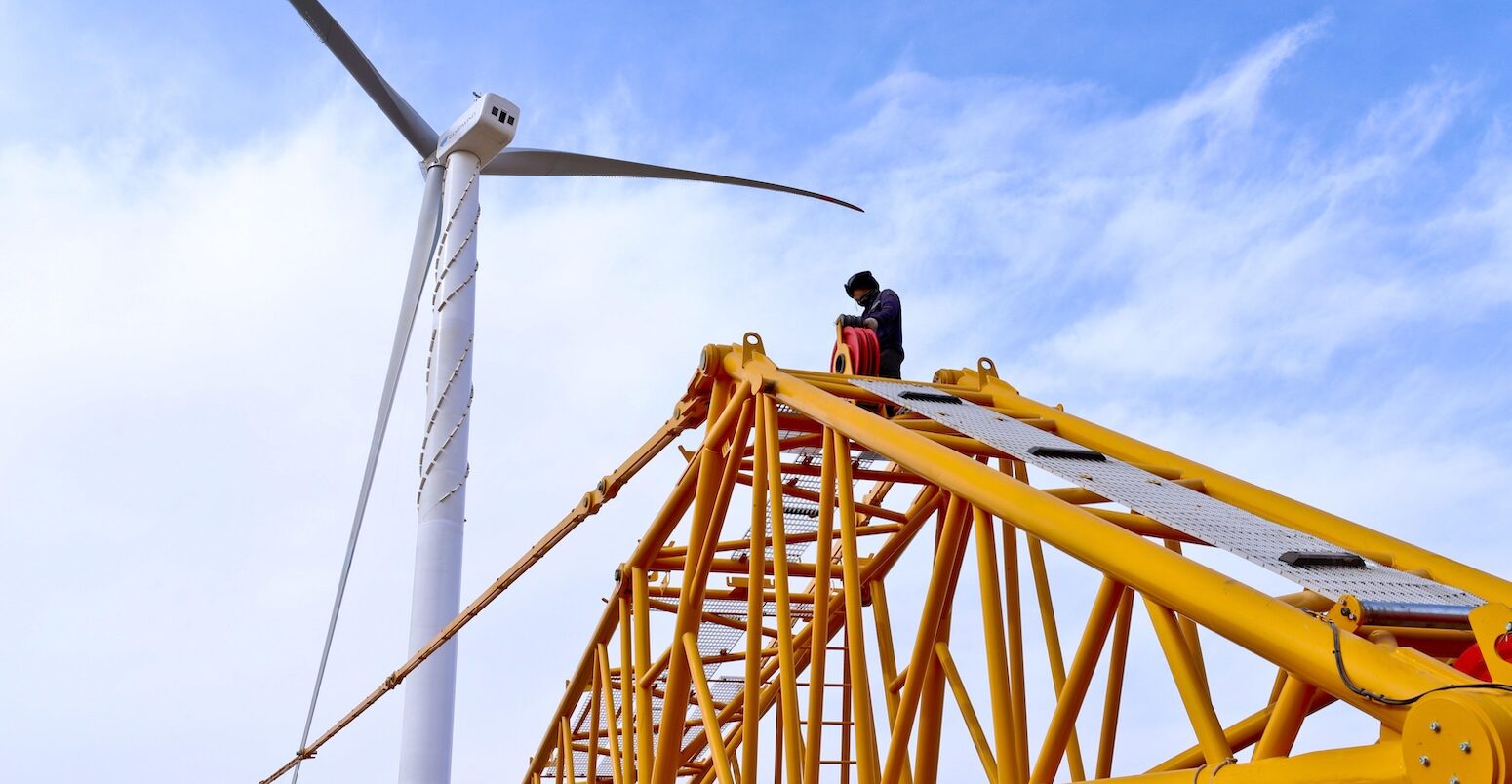 Builders working at a wind farm in Zhangye China.