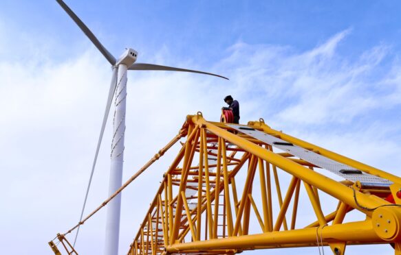 Builders working at a wind farm in Zhangye China.
