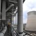 A worker inspects facilites at a coal-fired power plant in Wuhan, central China.