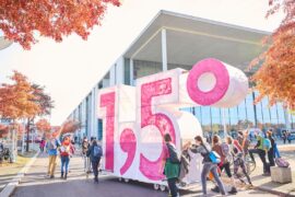Demonstrators from Extinction Rebellion push self-made cart in the shape of the 1.5 climate target in Berlin, Germany.