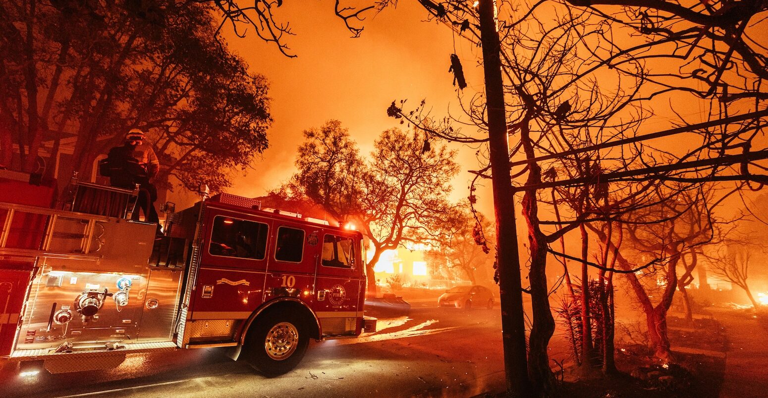 Palisades resident evacuate the area during the Palisades Fire on 7 January 2025.