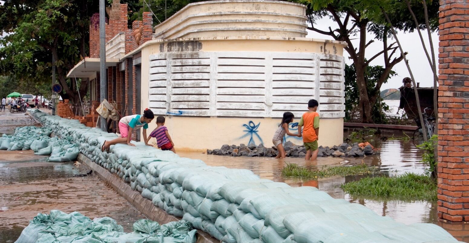 Stacked sandbags on the bank of the Mekong River to prevent flooding, Cambodia.