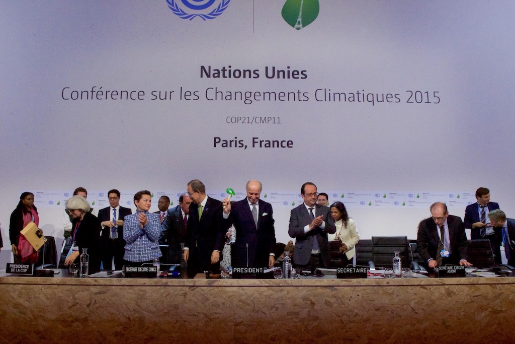 French Foreign Minister Fabius dropping the gavel after countries approved the Paris Agreement at COP21 in December 2015. Credit: 506 collection
